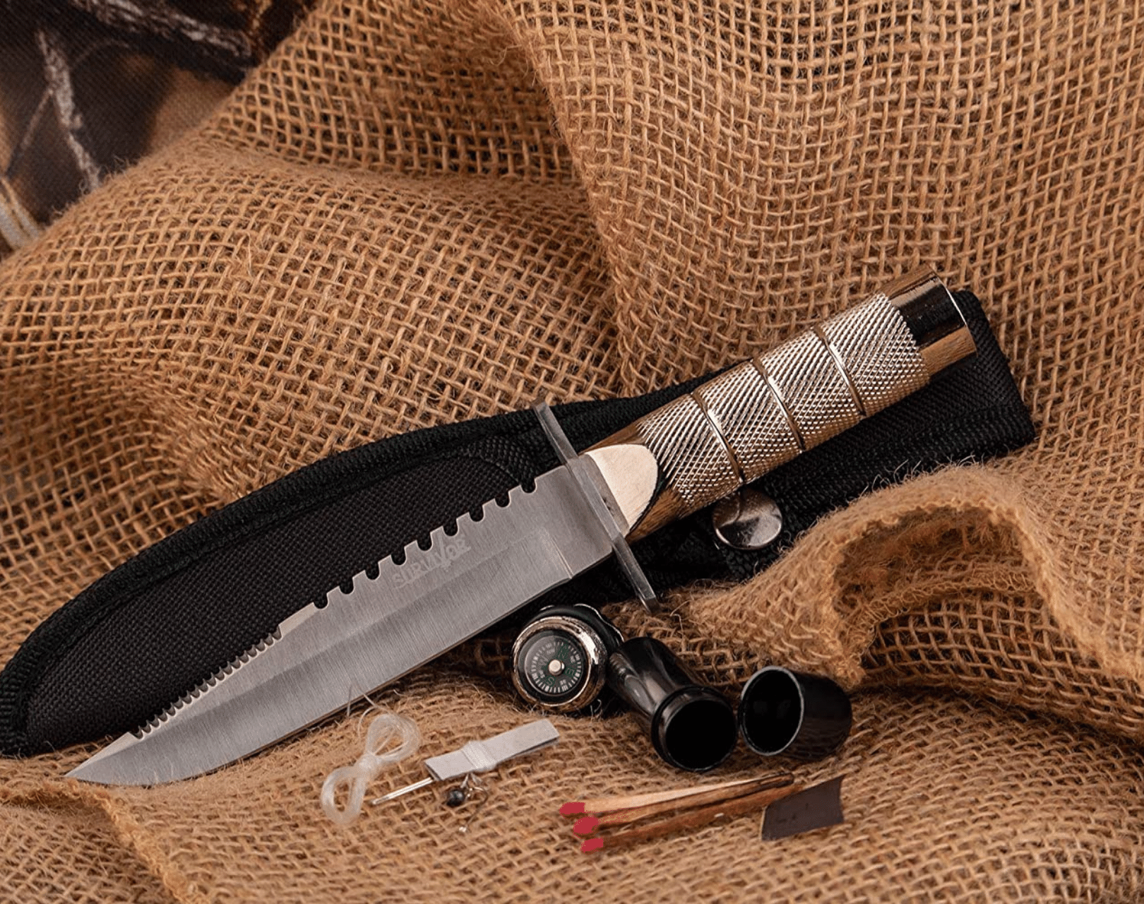 Compass, survival kit, knife blade, a survival knife with matches, fishing line and more.