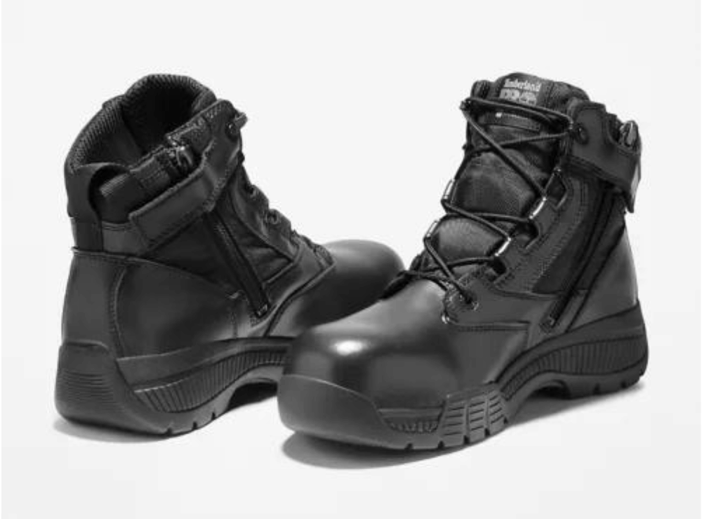 A pair of 6-inch Valor Tactical boots, laced and zipped, black, ready to be put to use.