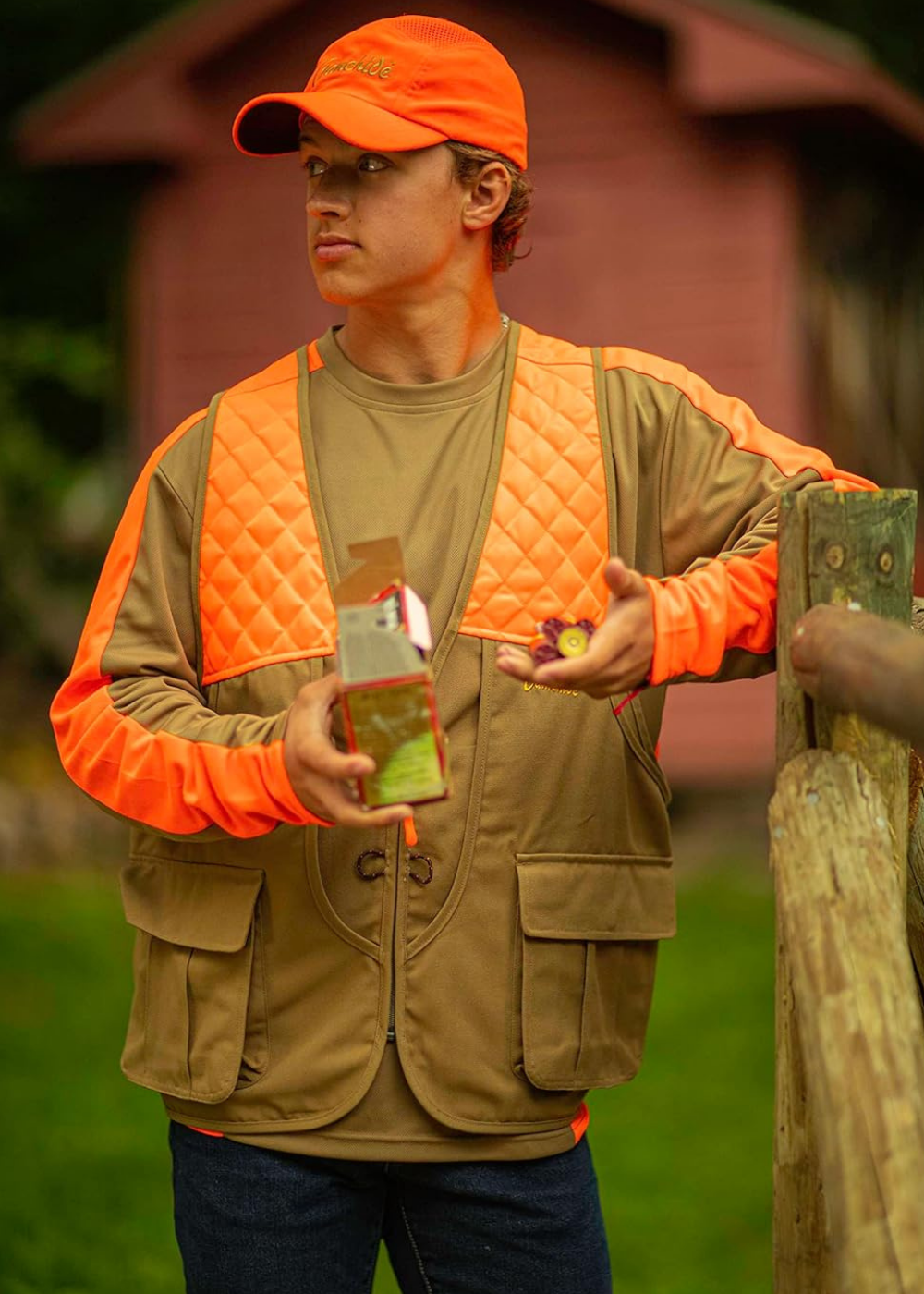A man wearing a hunting vest designed for upland birds and dove hunting.