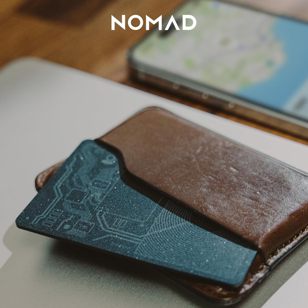 A Nomad card in a brown leather money clip!